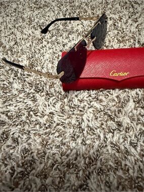 Cartier Gold Rimless Sunglasses with Black Temples